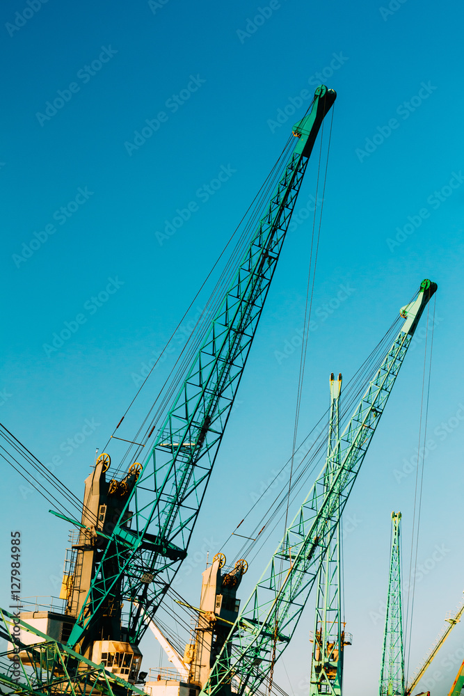 Old Heavy Loading Cranes In Port Dock Old Heavy Loading Cranes In Port Dock