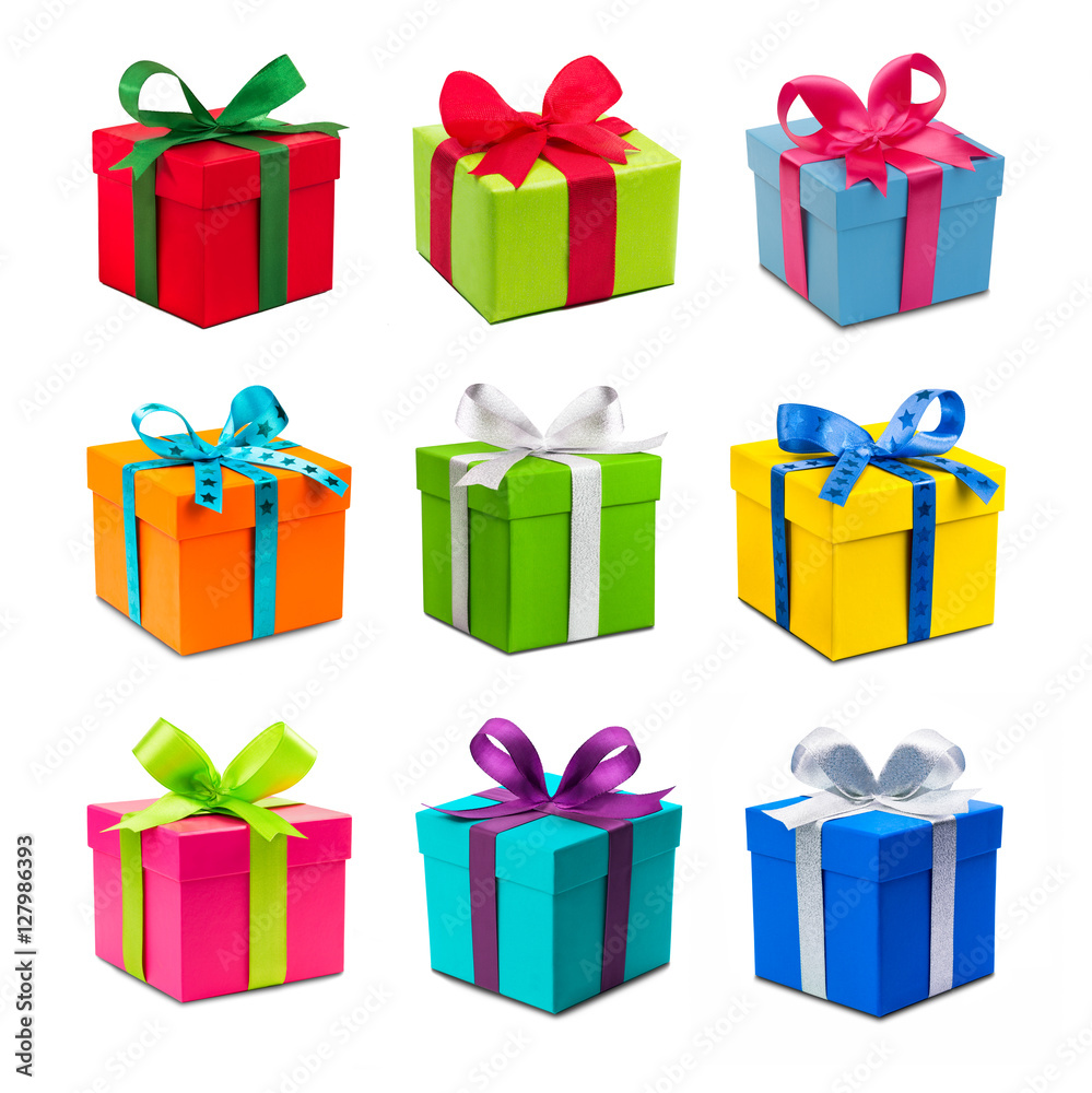 Bunte Weihnachtsgeschenke als Set vor weißem Hintergrund Bunte Weihnachtsgeschenke als Set vor weißem Hintergrund