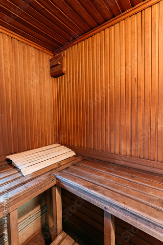 Interior Of Sauna. Wooden Walls And Shelves.