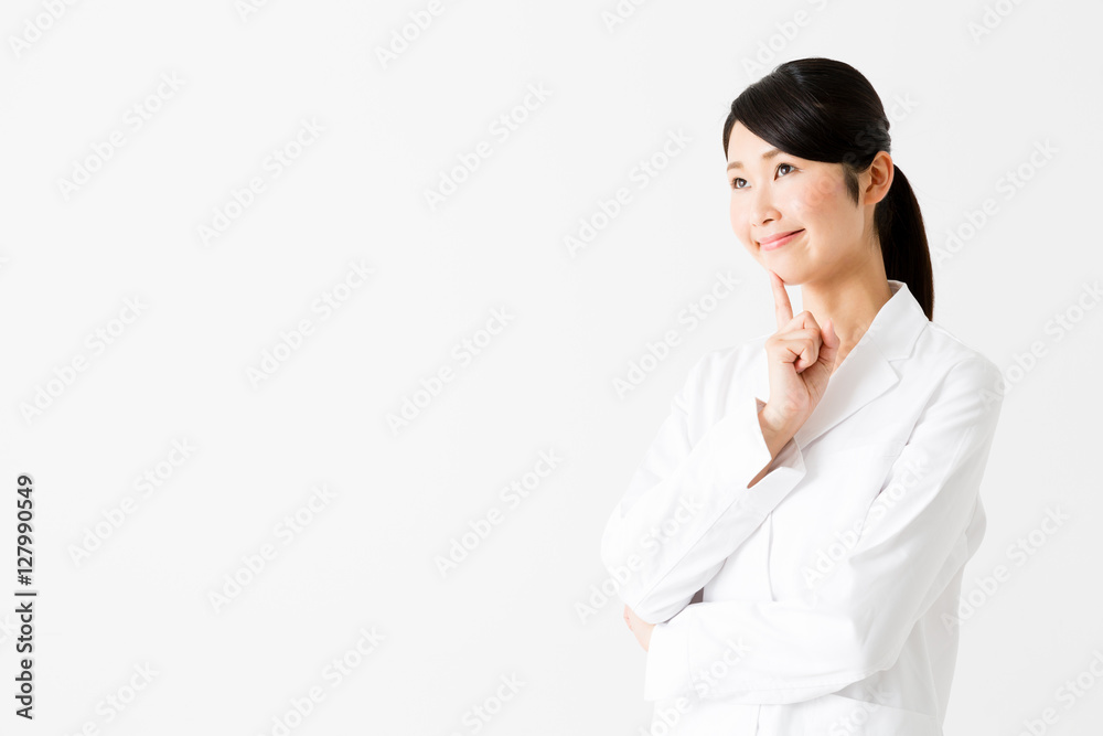 portrait of young asian doctor thinking isolated on white background portrait of young asian doctor thinking isolated on white background