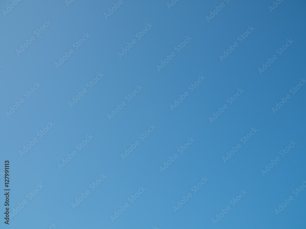 Clear blue sky background