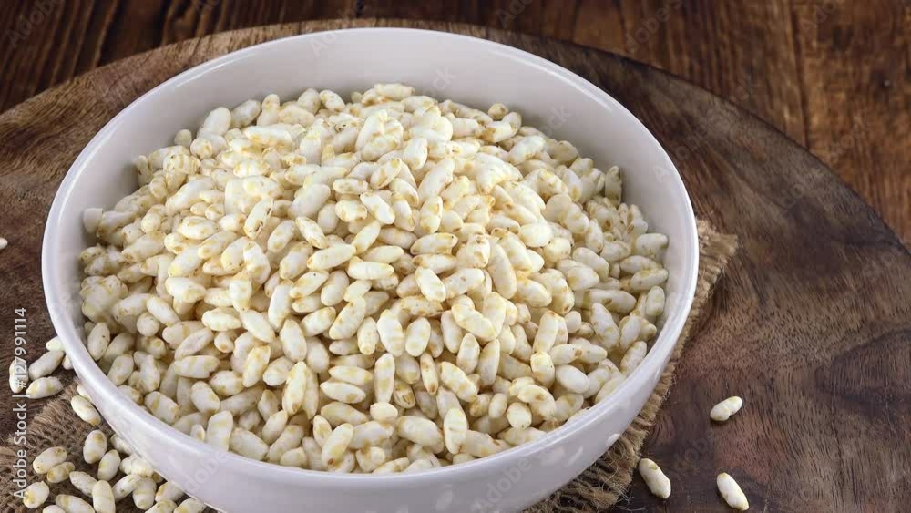 Portion of puffed Rice (rotating) as seamless loopable 4K UHD footage Portion of puffed Rice (rotating) as seamless loopable 4K UHD footage