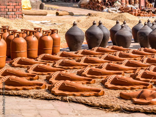 Pottery and Rice Drying in the Sun, Nepal photo