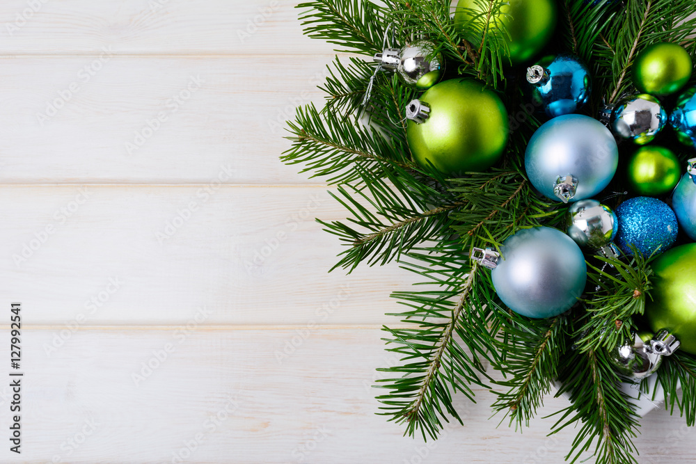 Christmas background with blue glitter ornaments