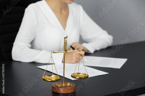 Scales of justice and busin...