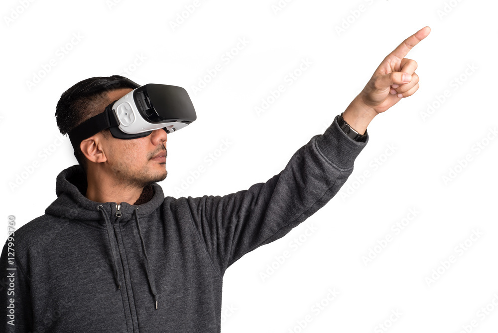 young asian man wearing virtual reality goggles young asian man wearing virtual reality goggles
