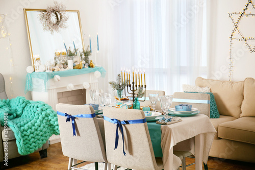 Interior of beautiful living room decorated for Hanukkah