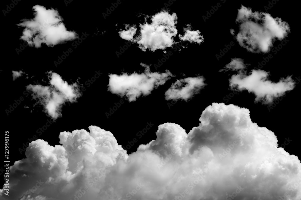 Set of isolated clouds on black background.