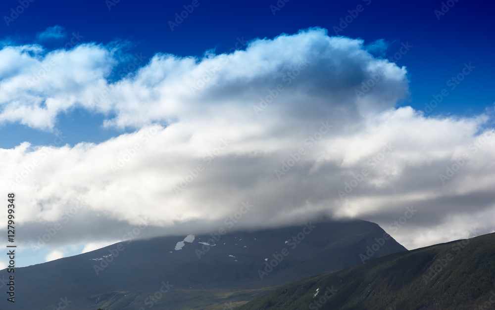 Fototapeta premium Norway mountains in overcast landscape background