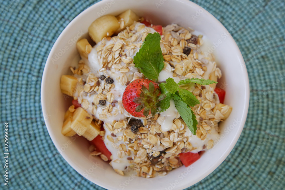 Healthy breakfast - cereal bowl with fruits Healthy breakfast - cereal bowl with fruits
