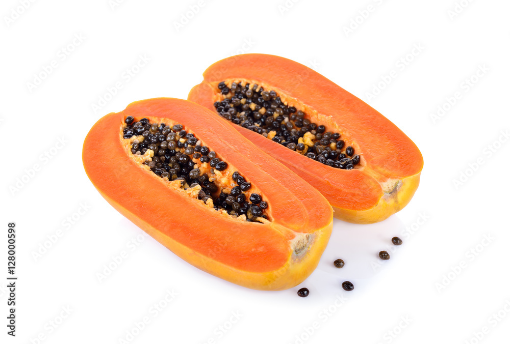 half cut ripe papaya with seed on white background