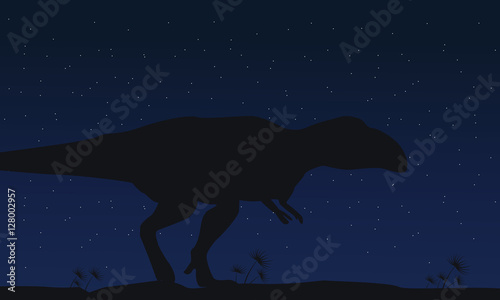 Silhouette of mapusaurus at night collection