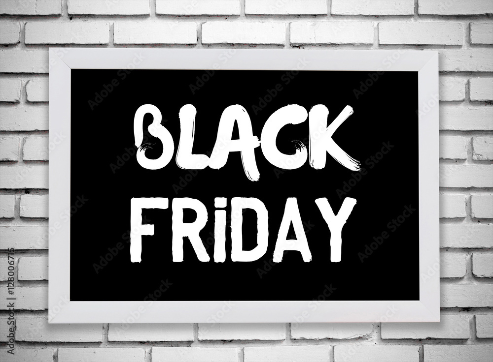 Black friday word on blackboard over white brick wall background Black friday word on blackboard over white brick wall background