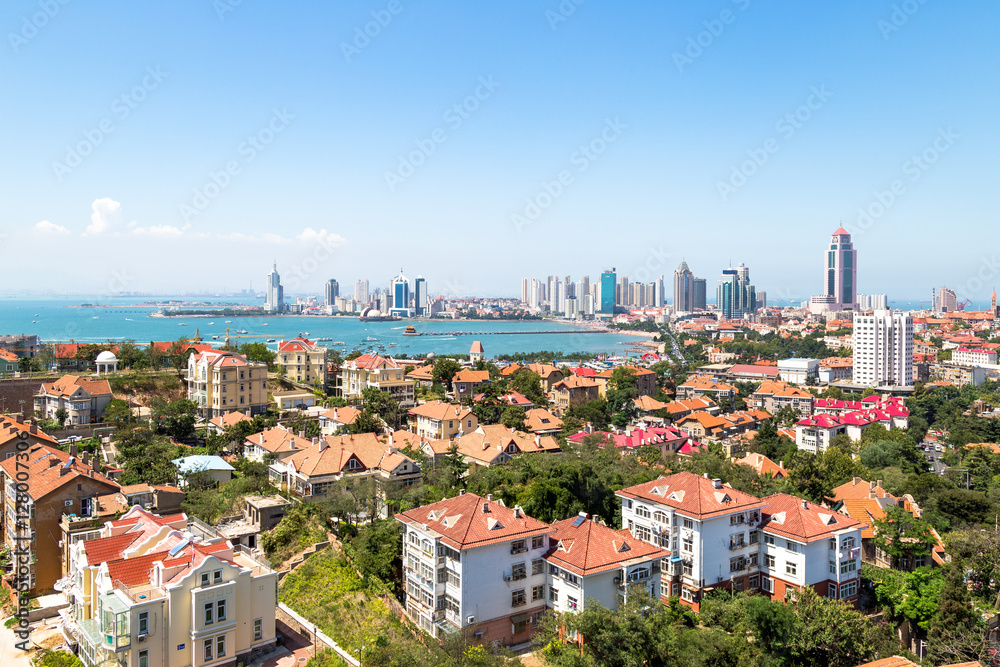 View of Old town and Qingdao bay from the hill of XiaoYuShan Park, Qingdao, China.