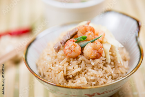 Taiwanese traditional food - Tainan Shrimp rice. With shrimp, ginger, pork, and scallion on top.