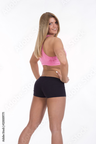 Athlete girl showing her body
