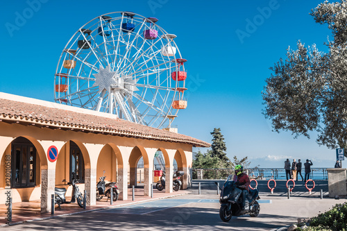Multicolour ferris wheel and small square around