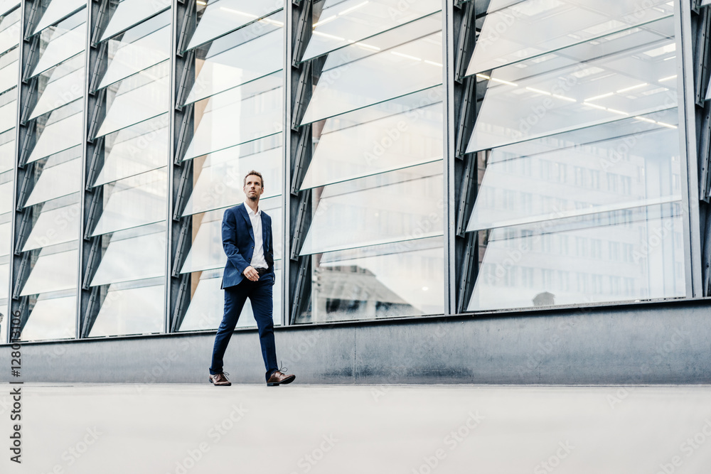 Germany, Berlin, businessman walking at Potsdamer Platz Germany, Berlin, businessman walking at Potsdamer Platz