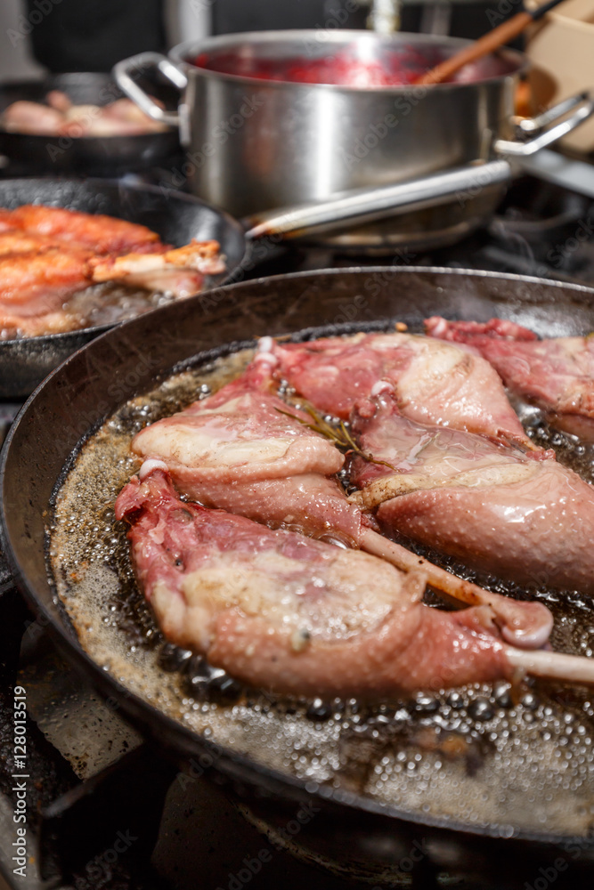 Goose drumstick frying in a pan Goose drumstick frying in a pan