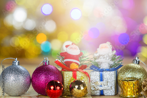 Foto Christmas decoration on wooden table with blurred light background