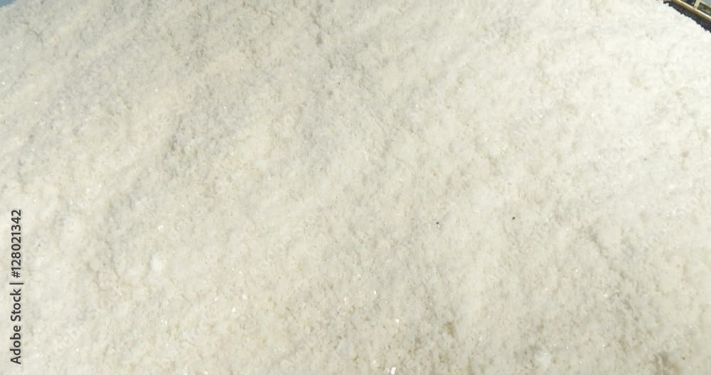 Salt evaporation ponds and heaps of salt in Sicily (Italy) Salt evaporation ponds and heaps of salt in Sicily (Italy)