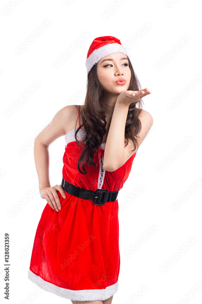 Christmas Woman. Beauty Asian Model Girl in Santa Costume isolat Christmas Woman. Beauty Asian Model Girl in Santa Costume isolat
