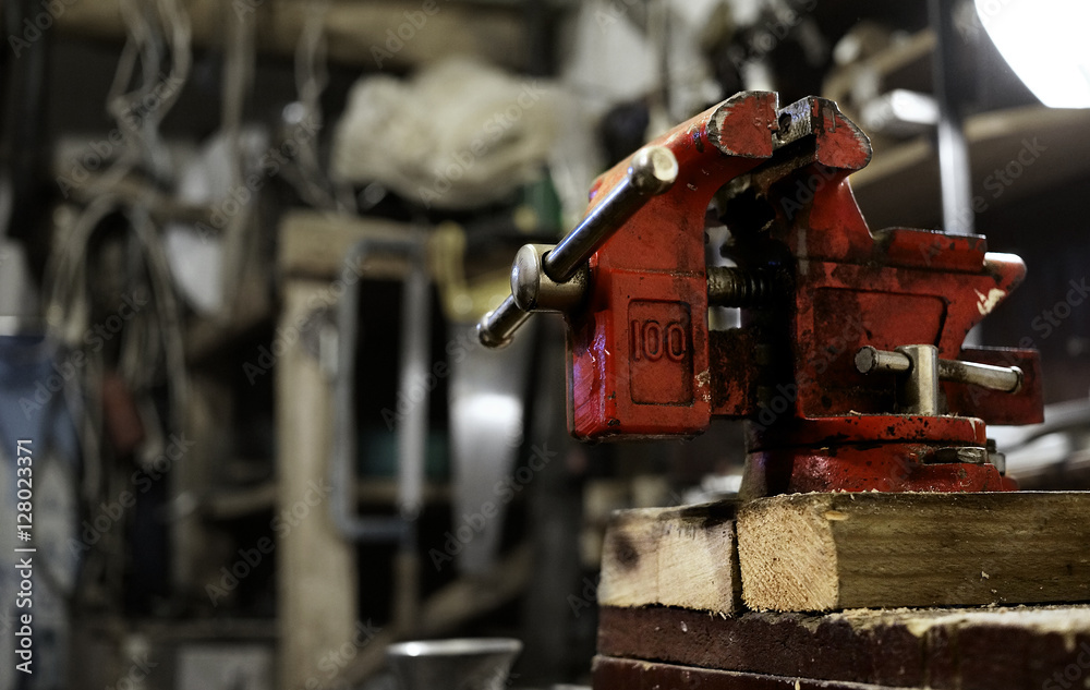 Red vise in a workshop Red vise in a workshop