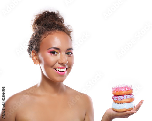 Attractive young woman hold...