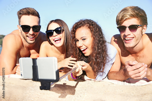 Happy friends taking selfie...