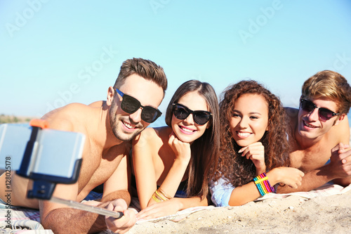 Happy friends taking selfie...