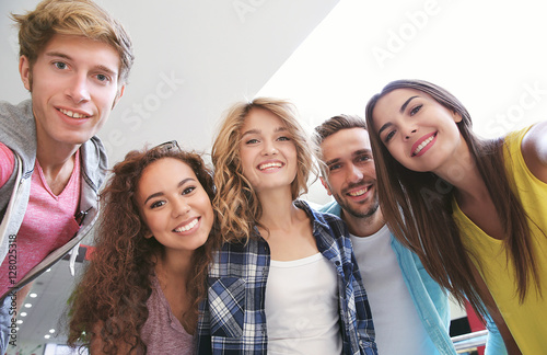 Happy friends taking selfie...