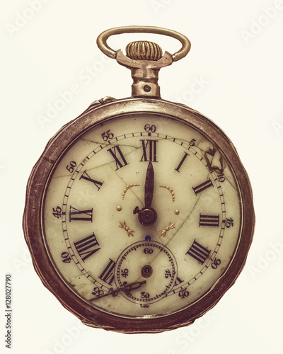 Antique decayed pocket watch isolated on white background, top view