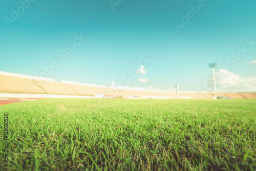 Green grass in soccer stadium , vintage