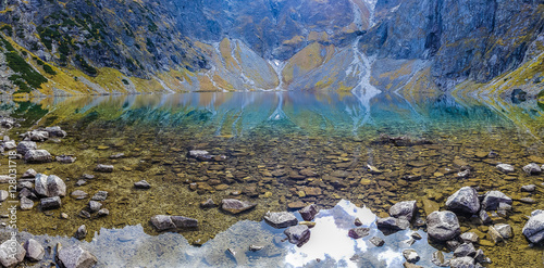 Panoramic view of the Polish Black Pond "Czarny Staw" in the High Tatra Mountains, Poland