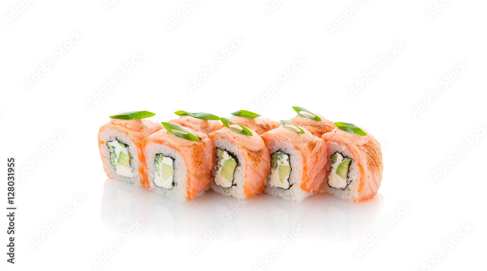 Salmon sushi roll with avocado, green onion and spice sauce isolated on white backgroind Salmon sushi roll with avocado, green onion and spice sauce isolated on white backgroind