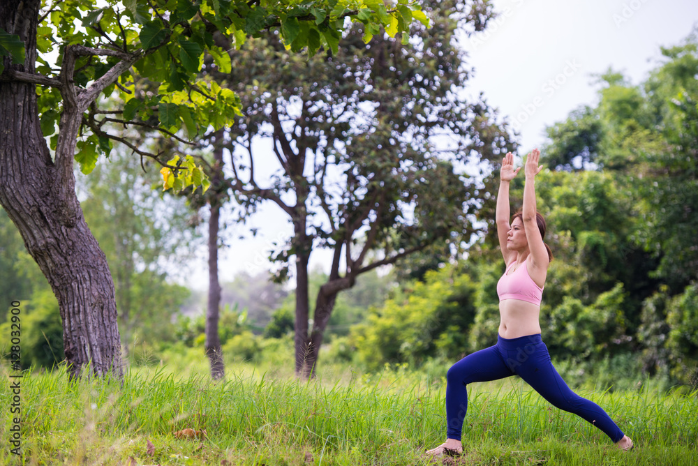 Young woman doing yoga.