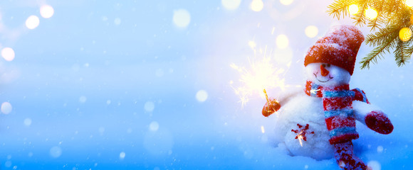 Christmas holidays composition on blue snow background with copy