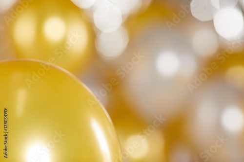 Golden and silver balloons background. New Year concept 