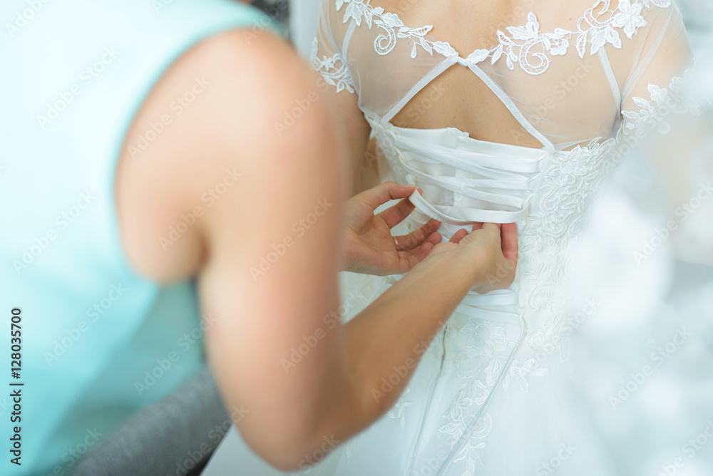 Bridesmaid Arranging Corset
