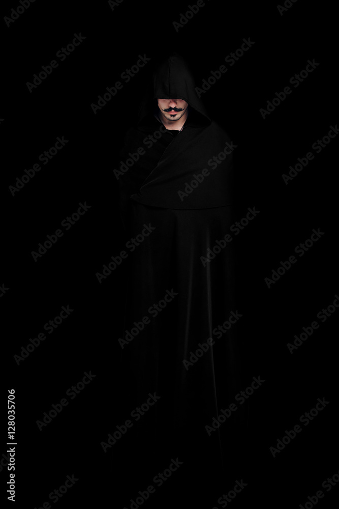 Mysterious man in a black cloak