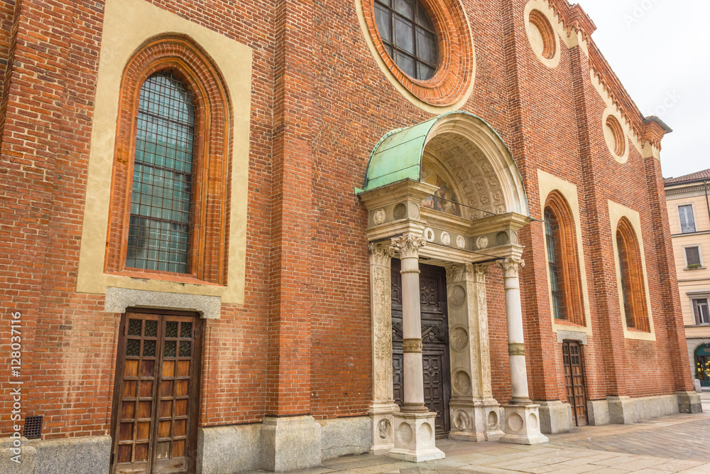 Obraz premium Facade of the Milan's famous church Santa Maria Delle Grazie, Saint Mary, hosting in it's refectory, The Last Supper mural painting by Leonardo da Vinci.