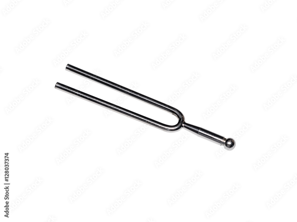 Isolated tuning fork on white background, old condition Isolated tuning fork on white background, old condition