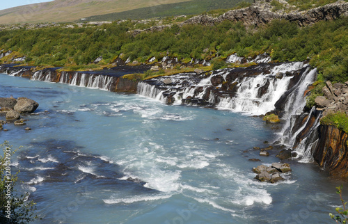 Die Wasserfälle Hraunfossar im Westen von Island photo