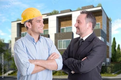 Successful architect and businessman smiling outdoors