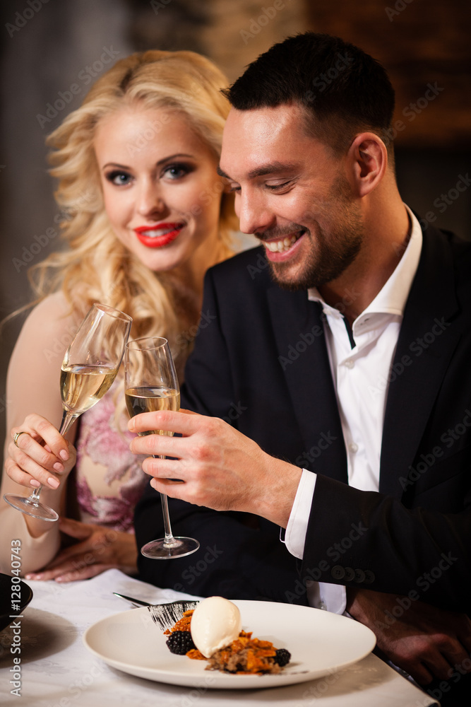 Couple celebrating in restaurant Couple celebrating in restaurant