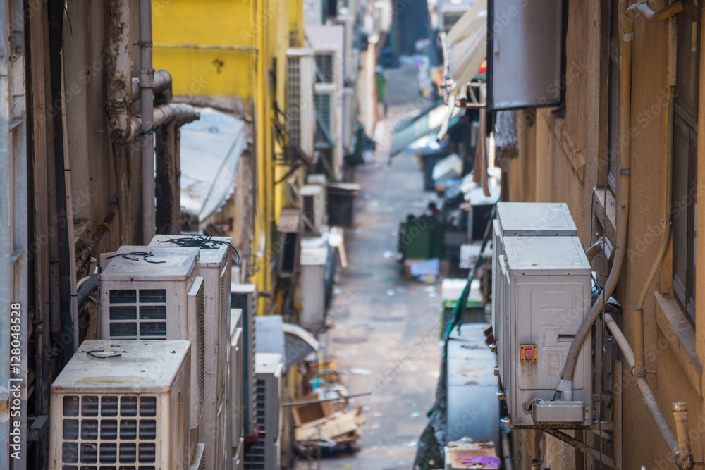 Behind Building in narrow alley Behind Building in narrow alley
