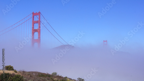 SAN FRANCISCO, USA - OCTOBER 5th, 2014: Golden Gate Bridge with heavy mist or fog as seen from Fort Point-