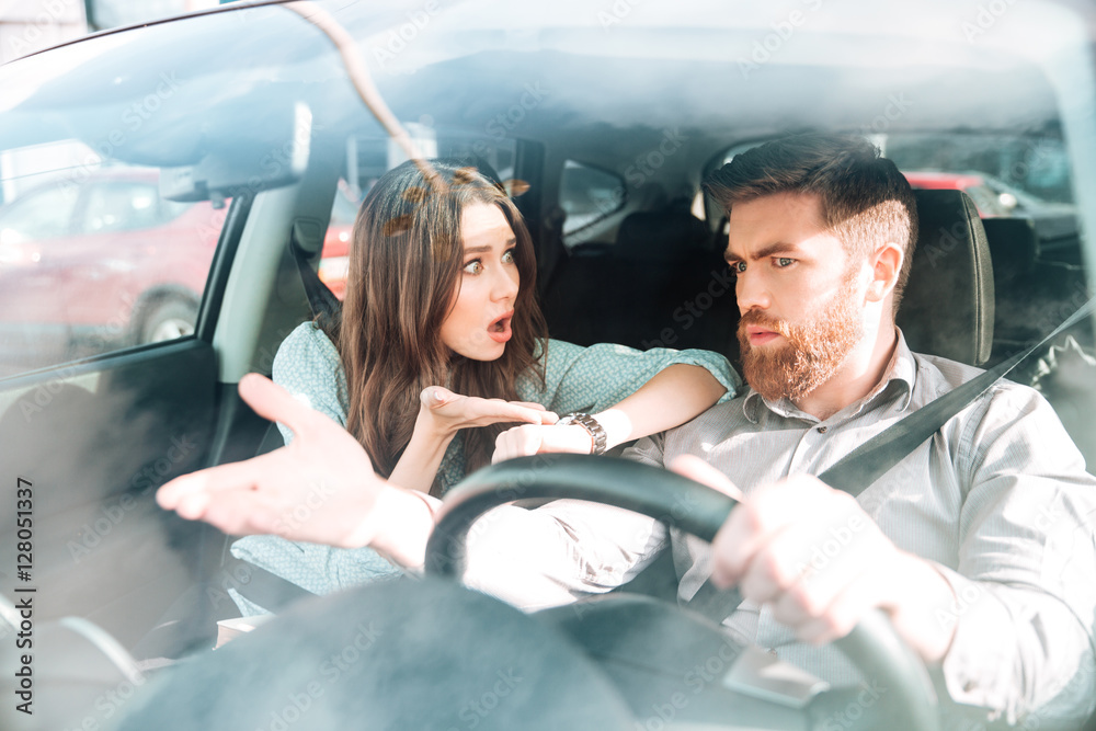 Unhappy couple in car Unhappy couple in car