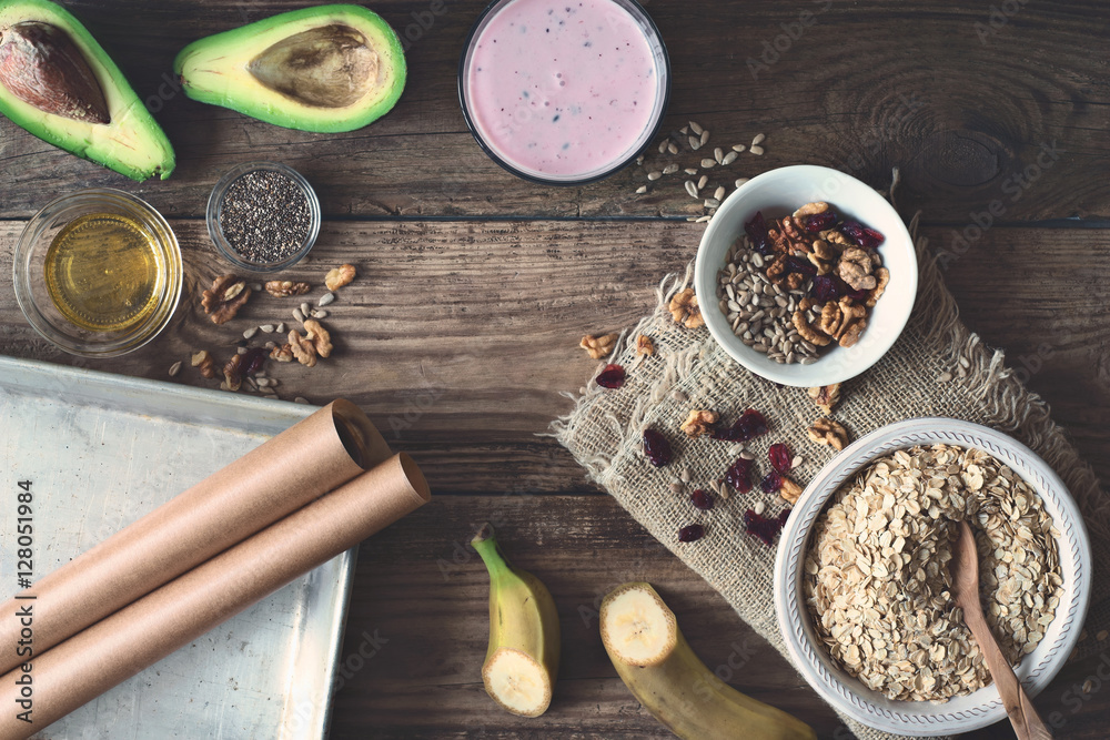 Ingredients for healthy breakfast on the wooden table  top view