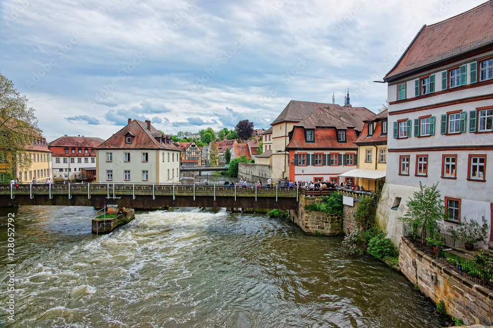 Old houses and Regnitz River in city center Bamberg